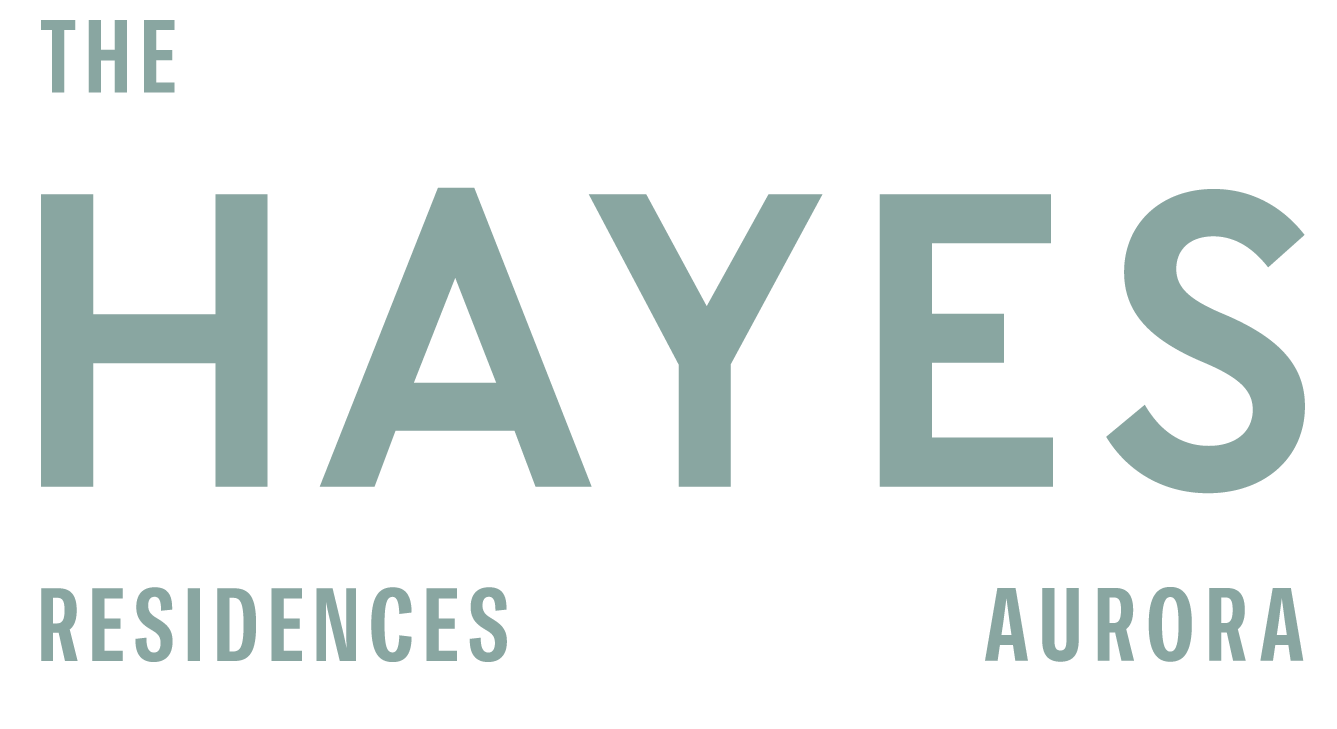 The Hayes Residences Aurora logo on a green background.